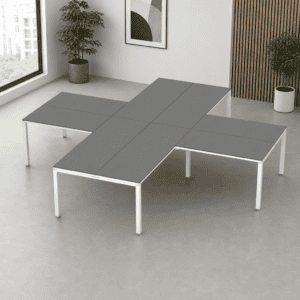 Mesa de oficina modular con superficie gris y estructura blanca para espacios de trabajo modernos.