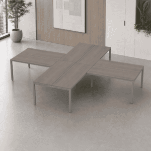 Mesa de oficina moderna en diseño cruzado, ideal para espacios de trabajo colaborativos.